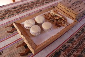 a box of cookies and nuts on a table at Establecimiento turistico LAS AMARAS in Tumbaya