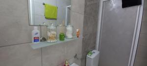 a bathroom with a sink and a mirror and a toilet at Studio LUX in Mağusa +42 photos