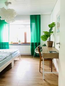 Postel nebo postele na pokoji v ubytování Eifel-House - FeWo