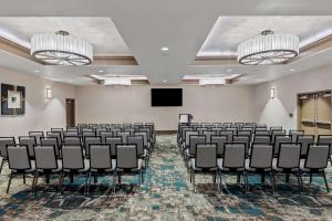 a conference room with chairs and a flat screen tv at Best Western Seaway Inn in Gulfport +31 photos