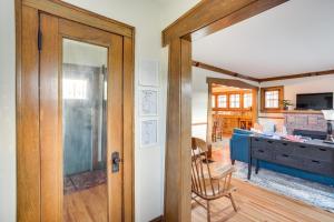 a door leading into a kitchen with a desk at 5 Mi to Mall of America South Minneapolis Home in Minneapolis