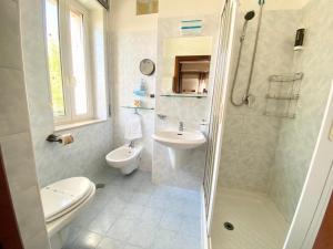 Koupelna v ubytování Hotel Praja Mare