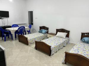 Postel nebo postele na pokoji v ubytování Studio Mohamed