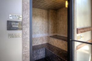 a bathroom with a shower stall with a shower sqor at Red Hawk Lodge #2213 in Keystone +20 photos