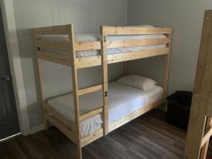 a couple of bunk beds in a room at Van Nuys Homes for the Soul in Los Angeles