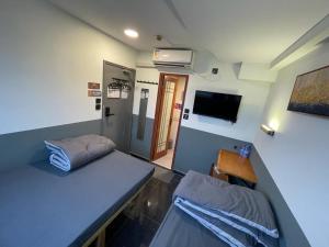 Η κουζίνα ή μικρή κουζίνα στο 香港榆臨賓館 Yulam Guesthouse