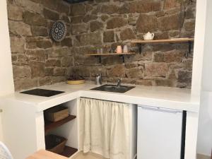 Kuchyň nebo kuchyňský kout v ubytování Chalet di campagna - da Aurora