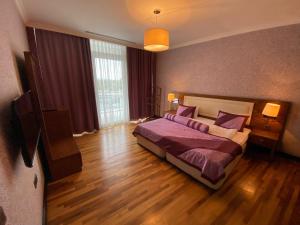 Postel nebo postele na pokoji v ubytování Agsaray Deluxe Hotel & SPA + 98 fotografií