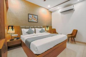 Postel nebo postele na pokoji v ubytování Hotel Devine Zirakpur Chandigarh