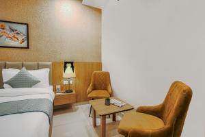 Postel nebo postele na pokoji v ubytování Hotel Devine Zirakpur Chandigarh