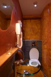 Koupelna v ubytování Hôtel Marchal