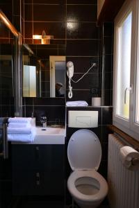 Koupelna v ubytování Hôtel Marchal