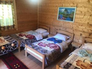 Postel nebo postele na pokoji v ubytování Guest House Ulaj