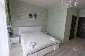 Postel nebo postele na pokoji v ubytování Oasis Karpat