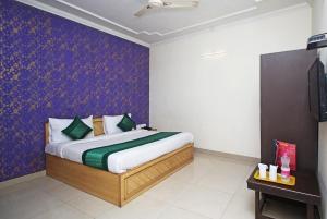 Postel nebo postele na pokoji v ubytování Hotel Smart Stay