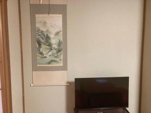 TV a/nebo společenská místnost v ubytování 余裕堂軽井沢山荘