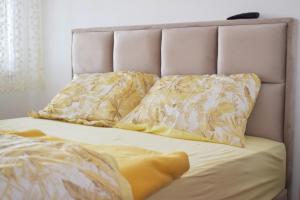 Postel nebo postele na pokoji v ubytování Apartman Raj