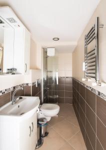 a bathroom with a toilet and a sink at Mini Harem Hotel in Istanbul +37 photos