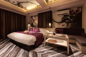 Postel nebo postele na pokoji v ubytování hotel AYA Adult Only
