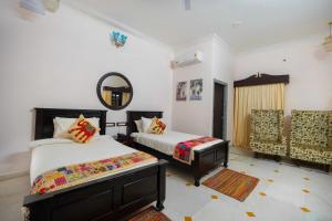 Postel nebo postele na pokoji v ubytování Amaatra Resorts