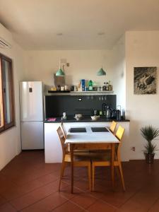 Kuchyň nebo kuchyňský kout v ubytování La Terrazza