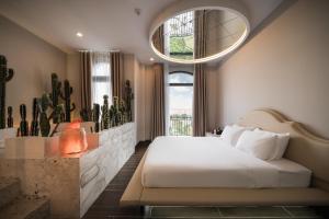 Hòa BìnhにあるX Sense Love Hotel - Vinhomes Ocean Park 2のギャラリーの写真