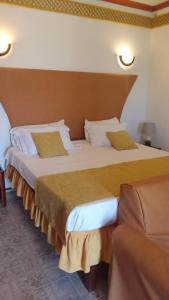Postel nebo postele na pokoji v ubytování Residencial Cabo Verde Palace