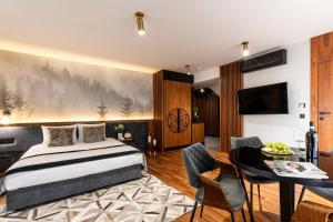 Posteľ alebo postele v izbe v ubytovaní Apartamenty Chramcówki 7