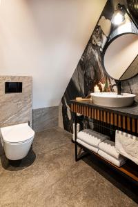 Kúpeľňa v ubytovaní Apartamenty Chramcówki 7