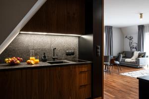 Kuchyňa alebo kuchynka v ubytovaní Apartamenty Chramcówki 7