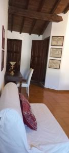 Llit o llits en una habitació de B&B A due passi dal Castello