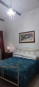Llit o llits en una habitació de B&B A due passi dal Castello