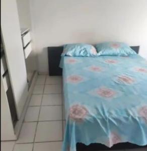 Katil atau katil-katil dalam bilik di Quartos na praia da jatiúca