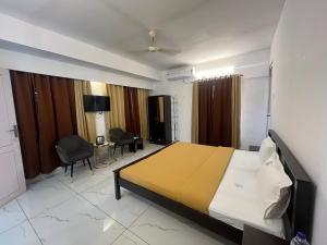 Katil atau katil-katil dalam bilik di Avanthi Homestay
