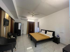 Televisyen dan/atau pusat hiburan di Avanthi Homestay +21 gambar