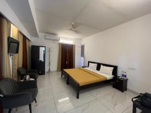 Televisyen dan/atau pusat hiburan di Avanthi Homestay