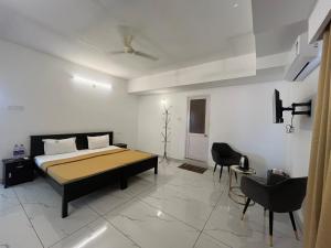 Katil atau katil-katil dalam bilik di Avanthi Homestay