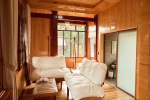 Posezení v ubytování Gỗ Home