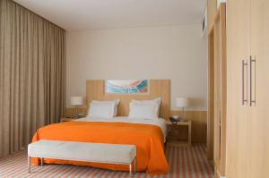 Кровать или кровати в номере Hotel Praia