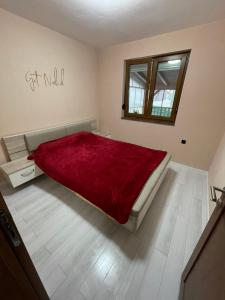 Katil atau katil-katil dalam bilik di Apartman D&L