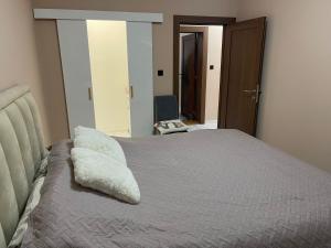 Katil atau katil-katil dalam bilik di Apartman D&L