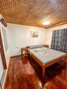 Postel nebo postele na pokoji v ubytování Hangout's Hostel El Nido + 25 fotografií