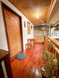 Kuchyň nebo kuchyňský kout v ubytování Hangout's Hostel El Nido
