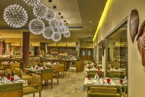A restaurant or other place to eat at The Gateway Hotel Ambad