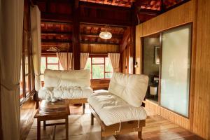 Posezení v ubytování Gỗ Home