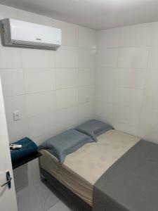 Voodi või voodid majutusasutuse Cantinho Aconchegante - Quarto 04 Ar-condicionado toas
