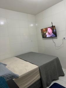 TV a/nebo společenská místnost v ubytování Cantinho Aconchegante - Quarto 04 Ar-condicionado