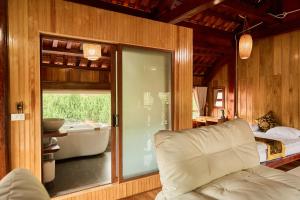 Posezení v ubytování Gỗ Home