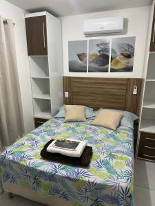 Postel nebo postele na pokoji v ubytování Cantinho Aconchegante - Quarto 01 AR-condicionado