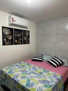 Voodi või voodid majutusasutuse Cantinho aconchegante - Quarto 02 AR-condicionado toas
